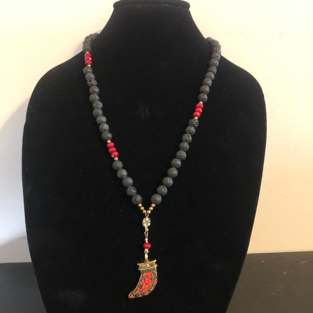 Coral mosaic horn pendant with elephant pendant, black lava beads & red jade.
